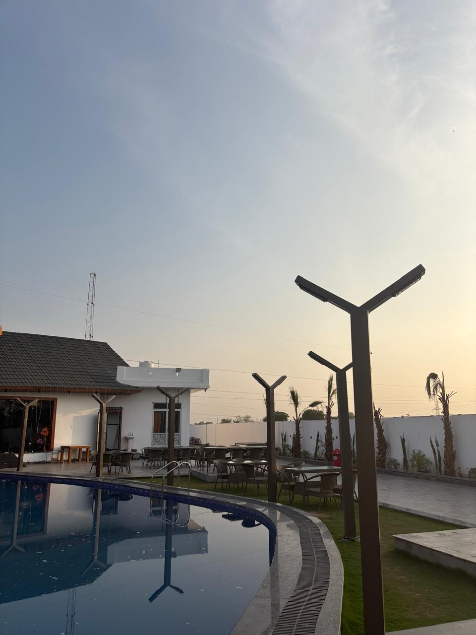Pool View Towards Main Building - Barrel & Bed Resort